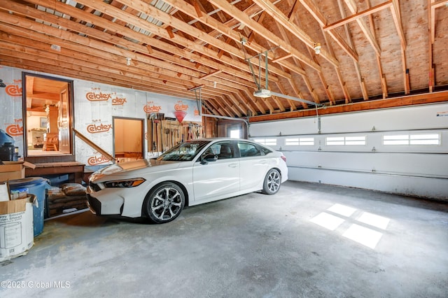 506 Nellis Rd, Palatine, NY 13339 - garage featuring a garage door opener