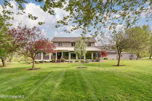 506 Nellis Rd, Palatine, NY 13339 - rear view of property with a yard, covered porch, and metal roof