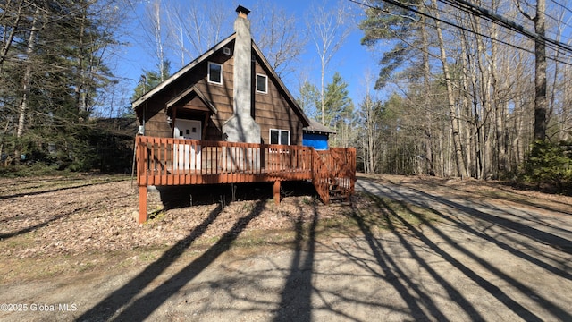 47 Davis Rd, Schroon, NY 12870 - rear view of property with a chimney and a wooden deck