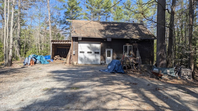 47 Davis Rd, Schroon, NY 12870 - garage with dirt driveway