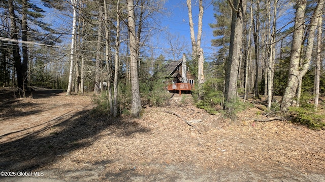 47 Davis Rd, Schroon, NY 12870 - view of yard with a forest view and a deck