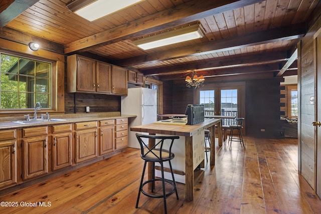 89 Captains Cv, Crown Point, NY 12928 - kitchen with wood counters, wood ceiling, light wood-type flooring, wooden walls, and a sink