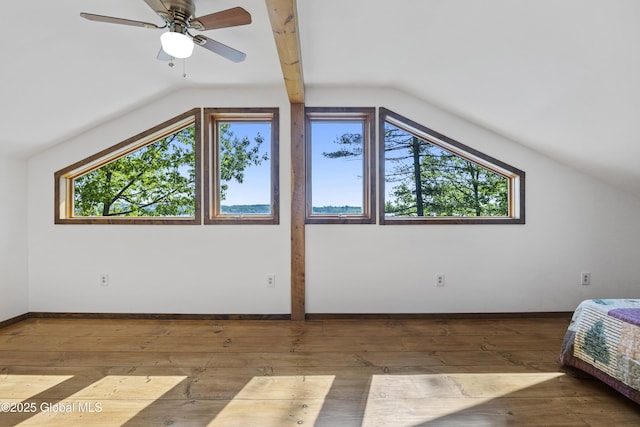 89 Captains Cv, Crown Point, NY 12928 - unfurnished bedroom with lofted ceiling, hardwood / wood-style floors, baseboards, and ceiling fan
