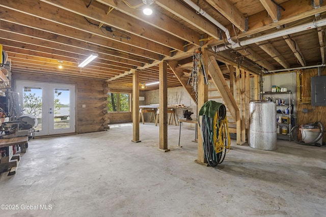 89 Captains Cv, Crown Point, NY 12928 - misc room featuring gas water heater, unfinished concrete flooring, and electric panel