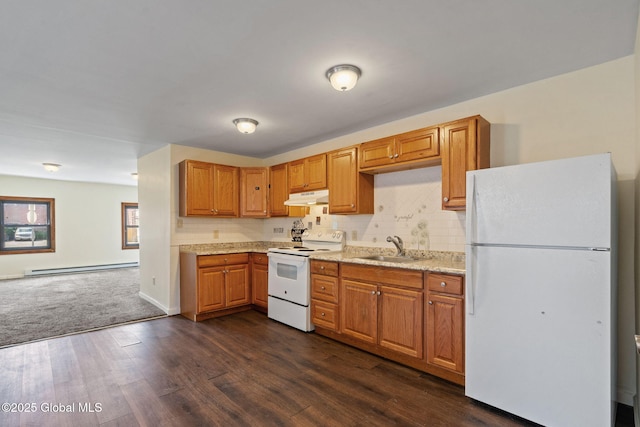 kitchen featuring under cabinet range hood, a baseboard heating unit, white appliances, a sink, and dark wood-type flooring