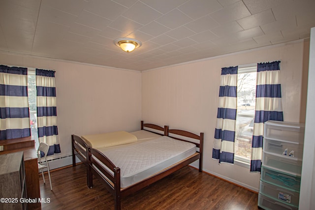 27 Kingsboro Ave, Gloversville, NY 12078 - bedroom featuring crown molding, wood finished floors, and a baseboard heating unit