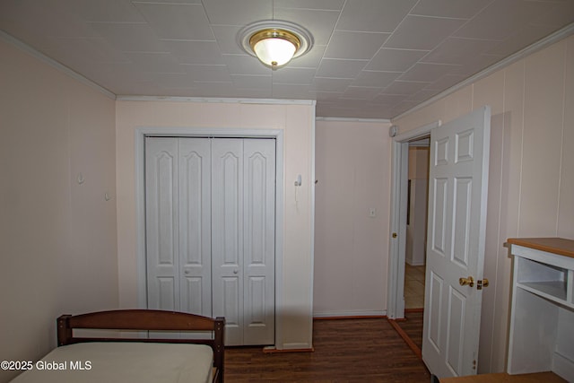 27 Kingsboro Ave, Gloversville, NY 12078 - bedroom featuring crown molding, a closet, and dark wood finished floors