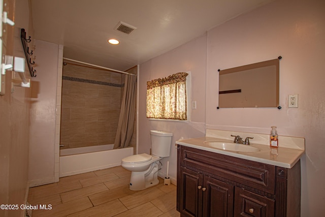 27 Kingsboro Ave, Gloversville, NY 12078 - full bathroom with toilet, shower / bath combo with shower curtain, visible vents, vanity, and recessed lighting