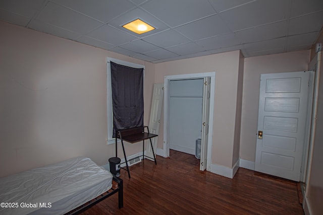 27 Kingsboro Ave, Gloversville, NY 12078 - unfurnished bedroom with a paneled ceiling, baseboards, and wood finished floors