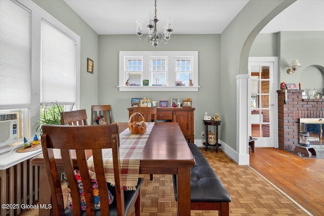 5 Hillview Ave, East Greenbush, NY 12144 - dining space featuring a chandelier and arched walkways
