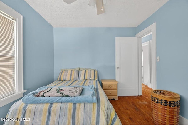 5 Hillview Ave, East Greenbush, NY 12144 - bedroom featuring wood finished floors, a textured ceiling, and a ceiling fan