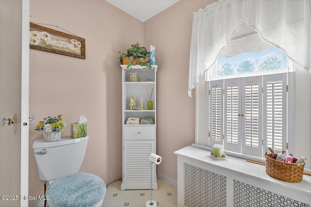 5 Hillview Ave, East Greenbush, NY 12144 - bathroom featuring toilet and radiator heating unit