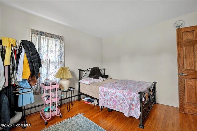 1576 State St, Schenectady, NY 12304 - bedroom with hardwood / wood-style floors and baseboards