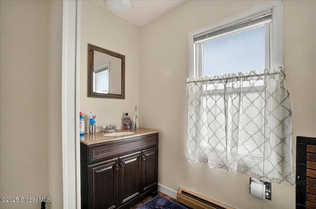 1576 State St, Schenectady, NY 12304 - bathroom with a baseboard radiator and vanity