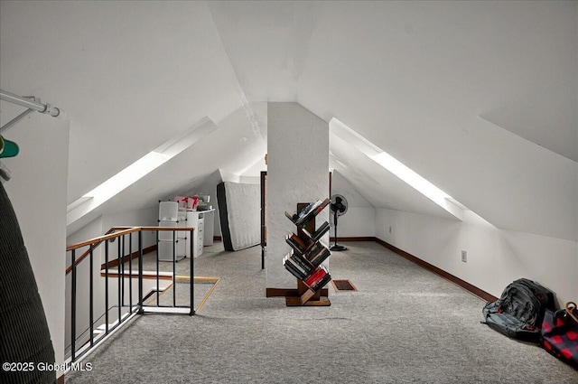 1576 State St, Schenectady, NY 12304 - additional living space with lofted ceiling, a skylight, carpet floors, and baseboards
