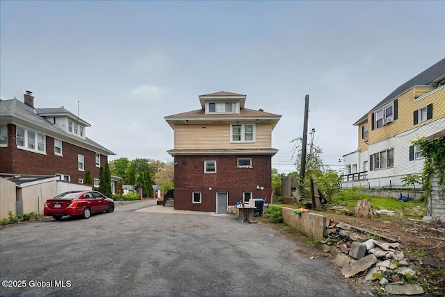 1576 State St, Schenectady, NY 12304 - rear view of house with fence