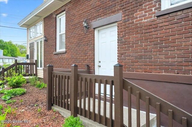 1576 State St, Schenectady, NY 12304 - doorway to property featuring brick siding