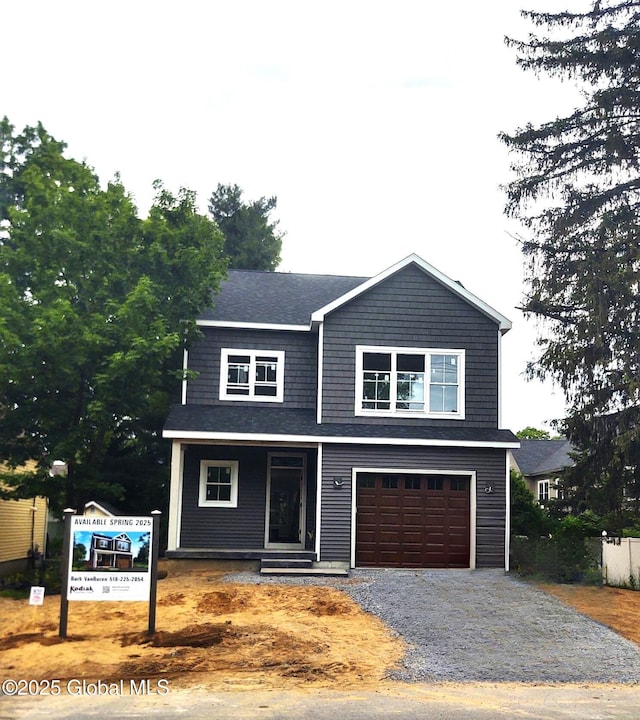 295 Jefferson St, Saratoga Springs, Inside, NY 12866 - craftsman house featuring gravel driveway, a garage, covered porch, and a shingled roof