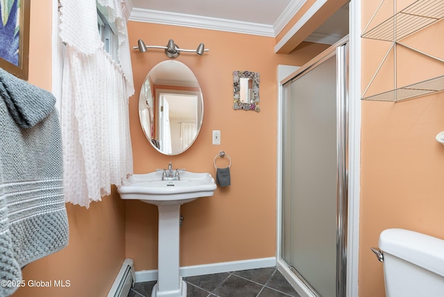 full bath featuring a shower stall, ornamental molding, toilet, baseboards, and tile patterned floors