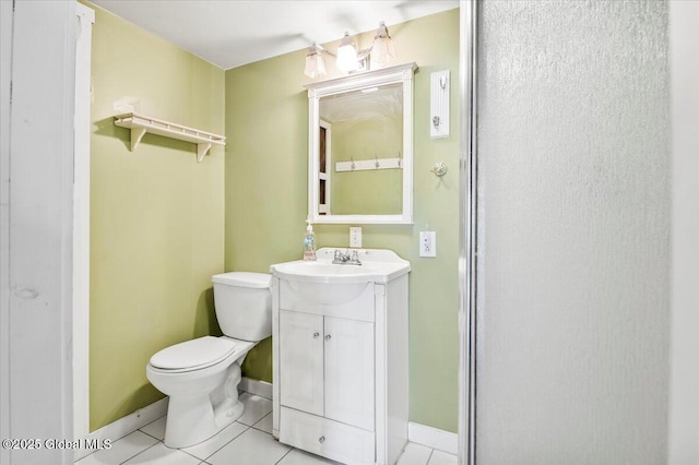 11 Cotton Ct, Bolton, NY 12824 - bathroom featuring tile patterned flooring, toilet, vanity, and baseboards