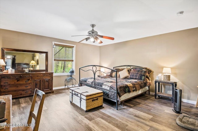 11 Cotton Ct, Bolton, NY 12824 - bedroom with wood finished floors, baseboards, and a ceiling fan