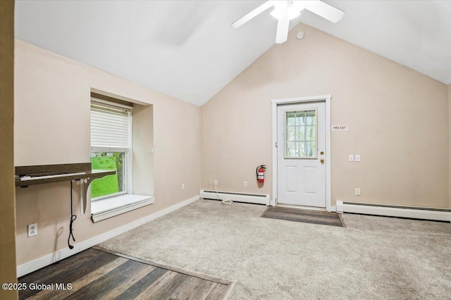 11 Cotton Ct, Bolton, NY 12824 - carpeted spare room featuring baseboard heating, ceiling fan, lofted ceiling, baseboards, and wood finished floors
