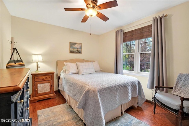 bedroom featuring light wood-style floors and ceiling fan