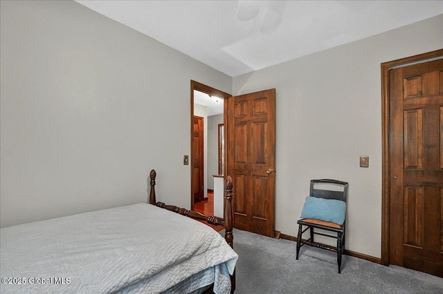 carpeted bedroom featuring a ceiling fan
