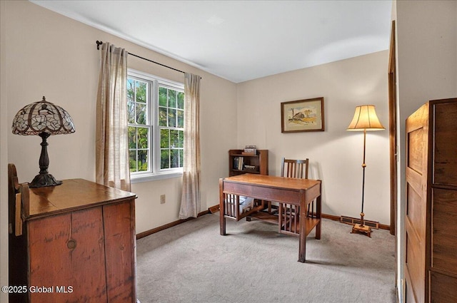 home office featuring carpet flooring and baseboards