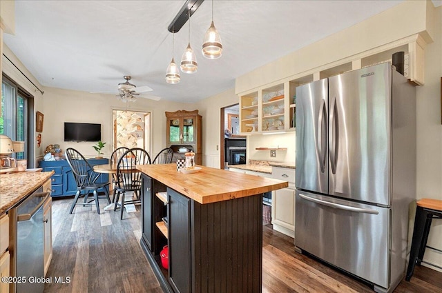 kitchen featuring butcher block countertops, stainless steel appliances, open shelves, dark wood-type flooring, and ceiling fan