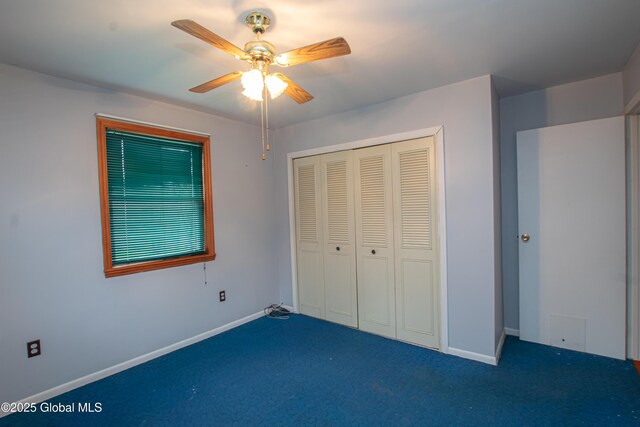 unfurnished bedroom featuring carpet floors, a closet, and baseboards