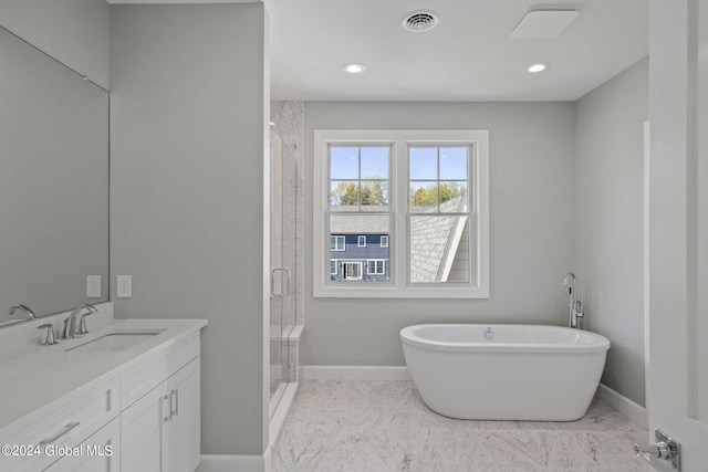 bathroom featuring a shower stall, baseboards, vanity, marble finish flooring, and recessed lighting