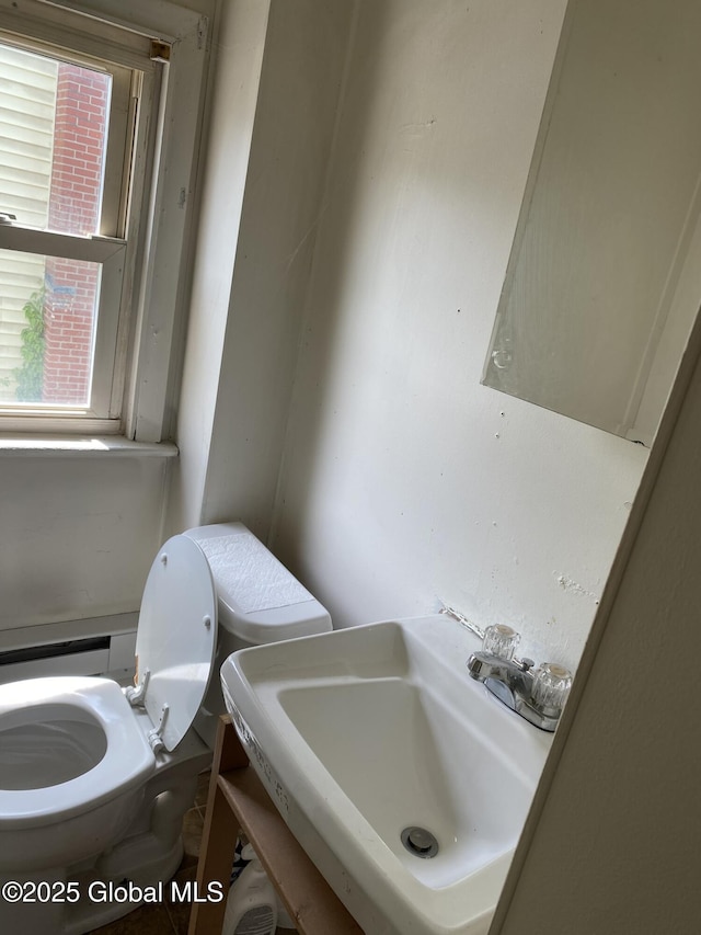 bathroom featuring a sink and toilet