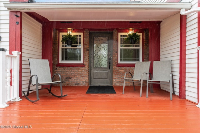 228 Maura Ln, Glenville, NY 12302 - entrance to property with covered porch and brick siding