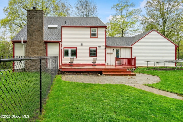 228 Maura Ln, Glenville, NY 12302 - back of property featuring a wooden deck, roof with shingles, a chimney, and a patio