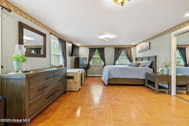 228 Maura Ln, Glenville, NY 12302 - bedroom featuring multiple windows and baseboard heating