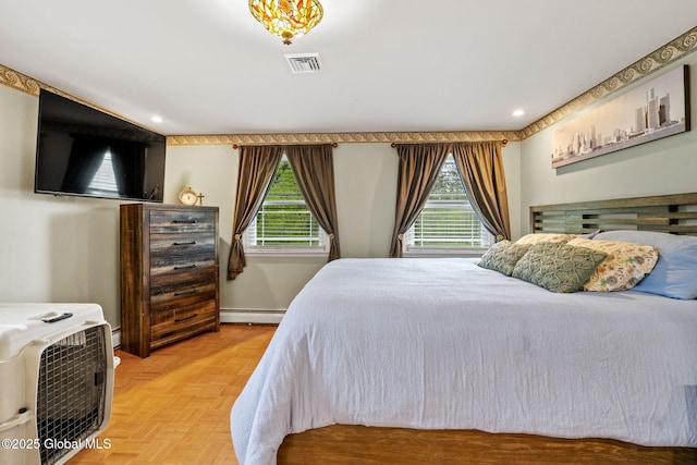 228 Maura Ln, Glenville, NY 12302 - bedroom featuring a baseboard heating unit, multiple windows, recessed lighting, and baseboards