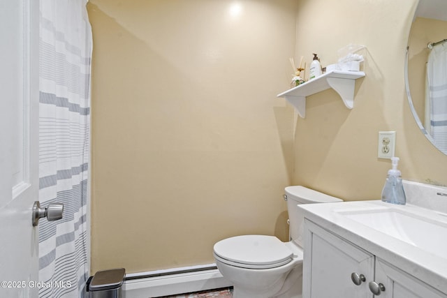 228 Maura Ln, Glenville, NY 12302 - bathroom featuring baseboard heating, toilet, vanity, and a shower with curtain