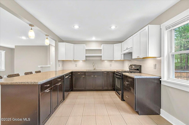 kitchen with a peninsula, black gas stove, open shelves, dishwasher, and under cabinet range hood