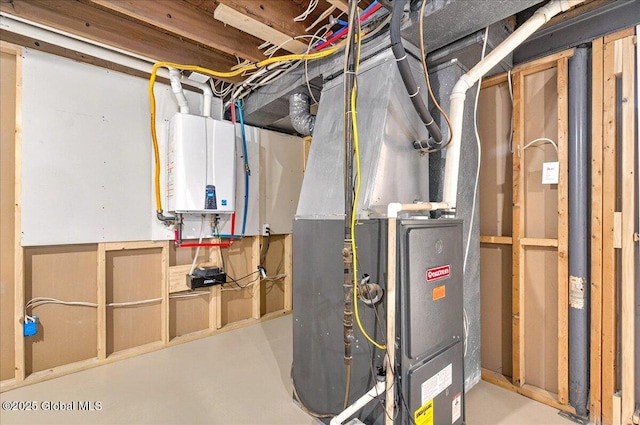 utility room featuring water heater