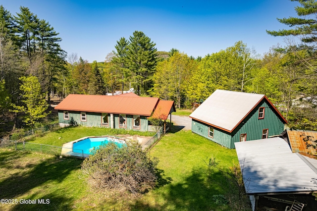 28 Buyce Cross, Thurman, NY 12810 - back of house with a wooded view, board and batten siding, and metal roof