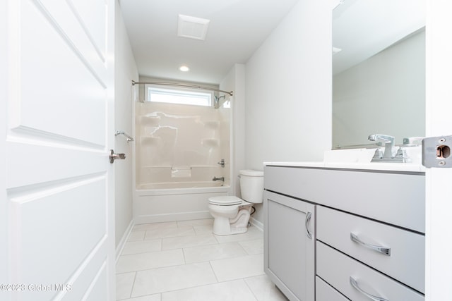 full bath with toilet,  shower combination, baseboards, tile patterned flooring, and vanity
