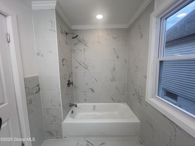 bathroom featuring tub / shower combination, marble look tiles, and ornamental molding