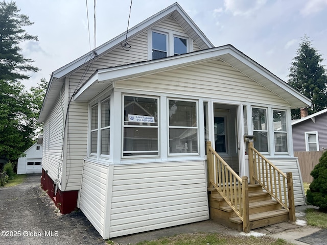 1732 Ave H, Schenectady, NY 12304 - view of front of property featuring a sunroom