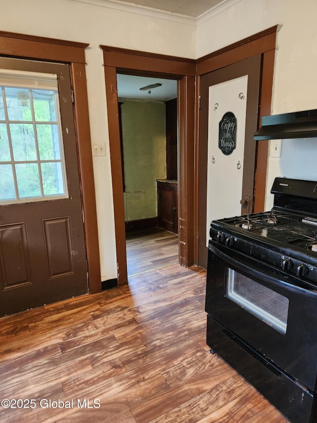 31 Fort Johnson Ave, Fort Johnson, NY 12070 - kitchen featuring ornamental molding, black gas stove, and wood finished floors