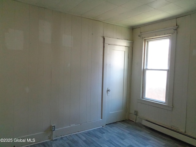 31 Fort Johnson Ave, Fort Johnson, NY 12070 - spare room with baseboard heating and wood finished floors