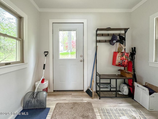233 Cleverdale Rd, Queensbury, NY 12804 - doorway to outside with light wood-style floors and crown molding
