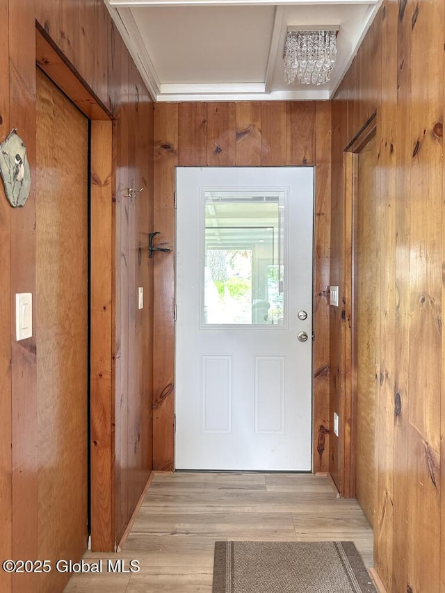 233 Cleverdale Rd, Queensbury, NY 12804 - doorway to outside featuring light wood-type flooring and wood walls