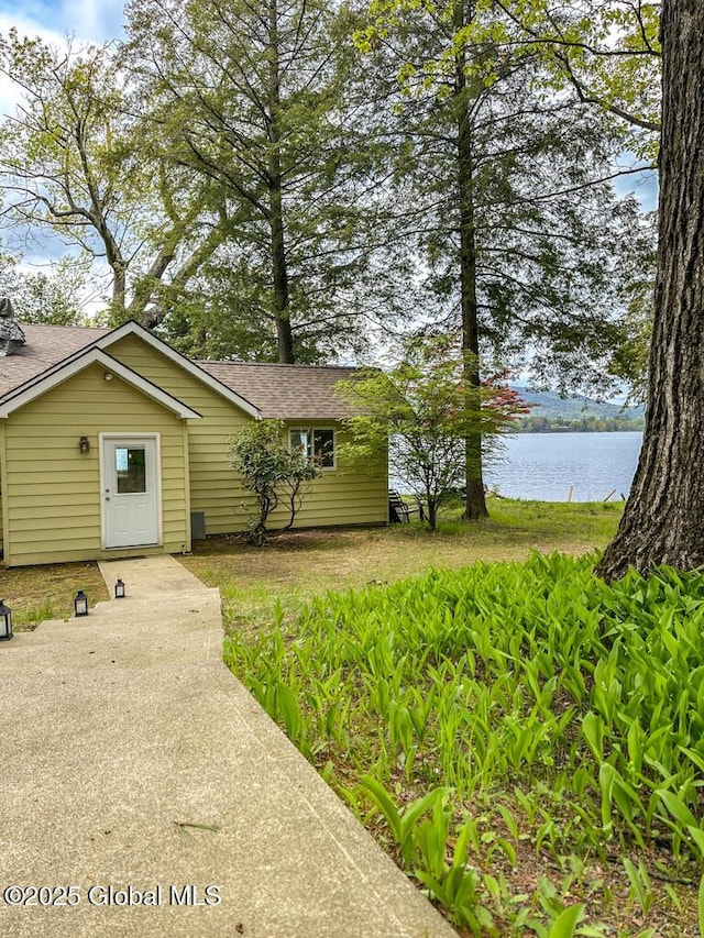 233 Cleverdale Rd, Queensbury, NY 12804 - view of front of property featuring a water view and a shingled roof