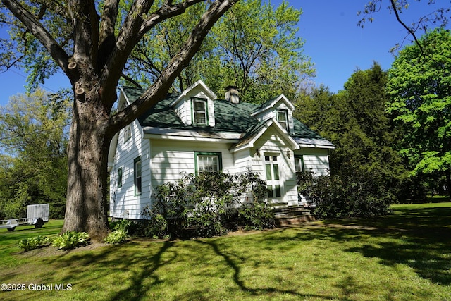 31 Thomas Ave, Hudson Falls, NY 12839 - cape cod-style house with a chimney and a front yard